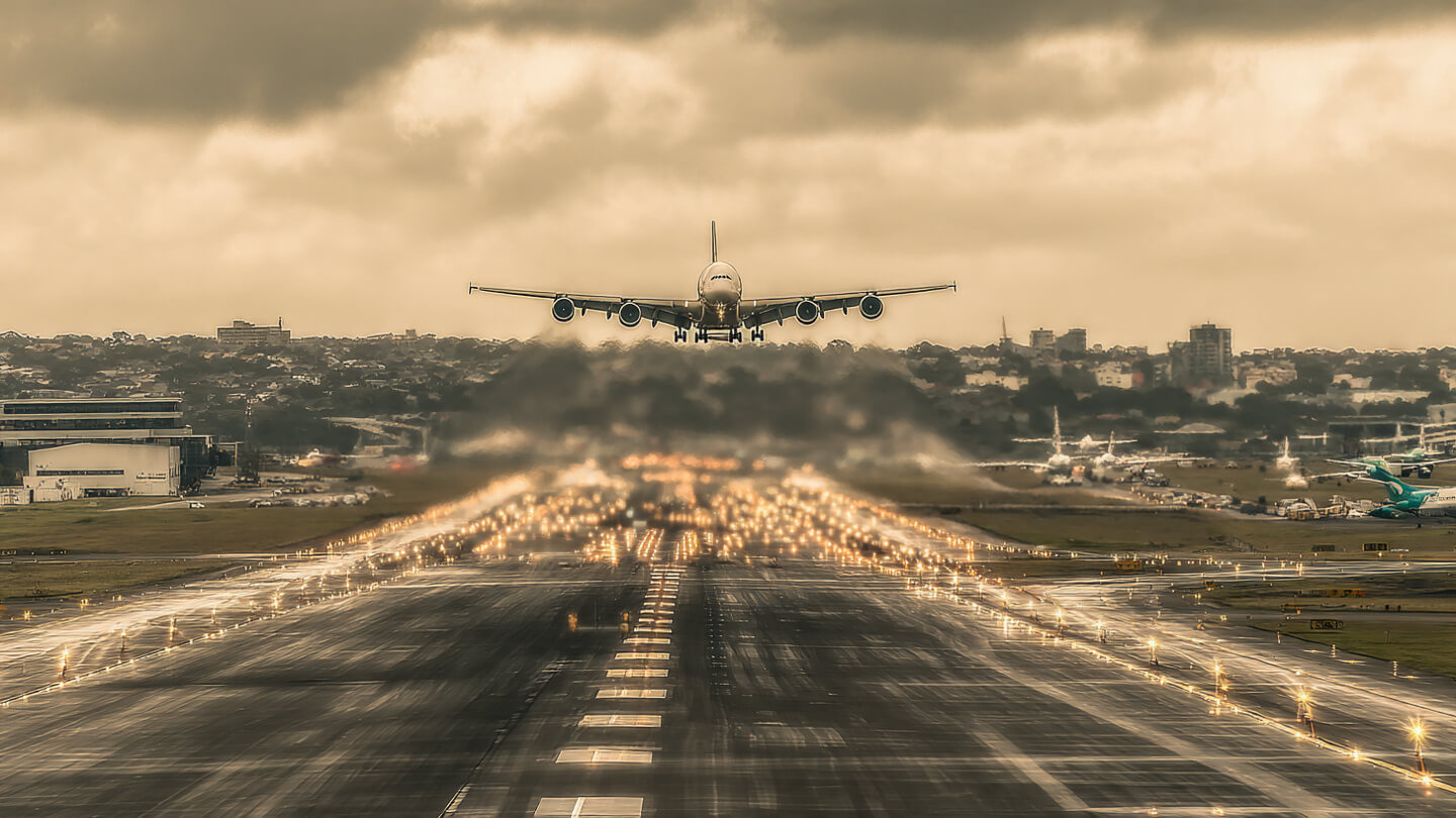 Airbus A380 taking off into the evening sky